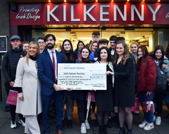 4th year students presenting a check for the Irish cancer society