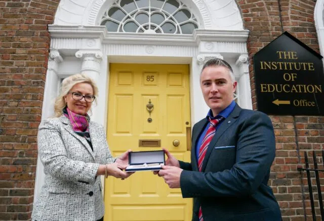 Yvonne O’Toole, Principal at The Institute, presented Dr. Michael Casey with a beautiful engraved gold presentation pen.