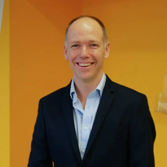 A photograph of Brian Scully