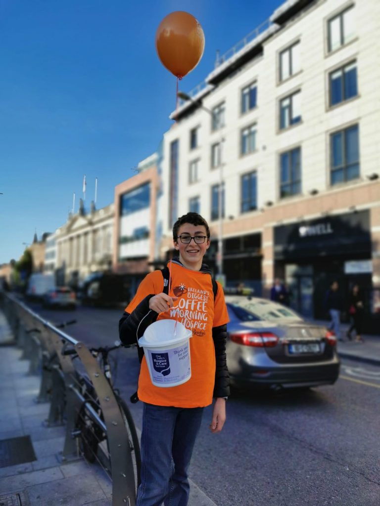 Student volunteer with bucket
