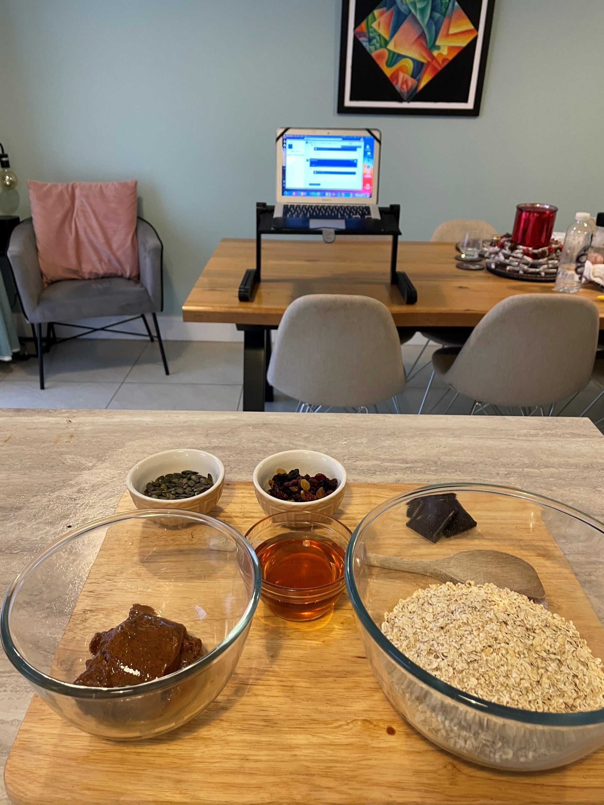 Image of the ingredients, with a laptop showing a google meet prominently in the background
