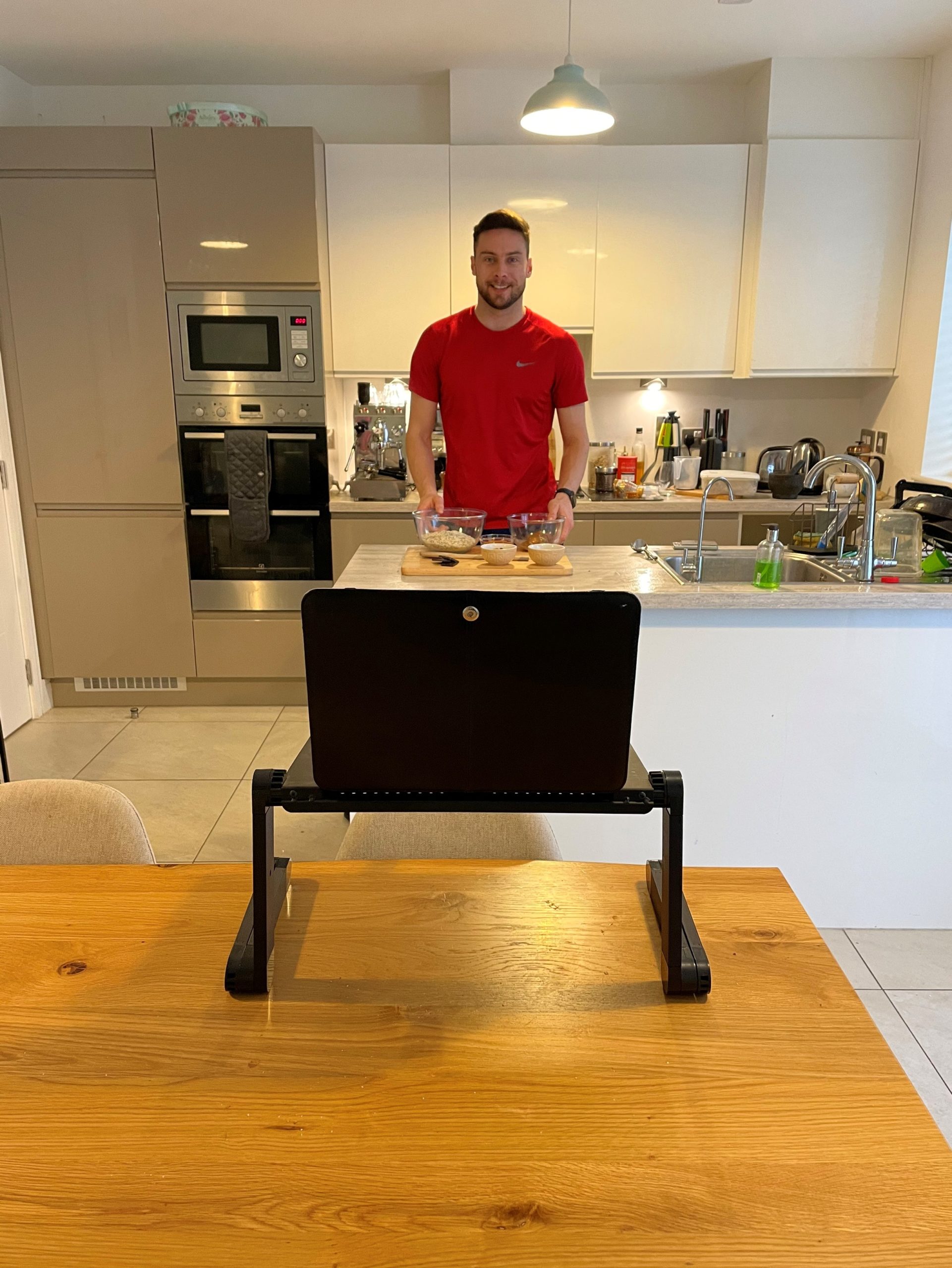 Image of Brian Gregan, behind a counter with the ingredients in front of him