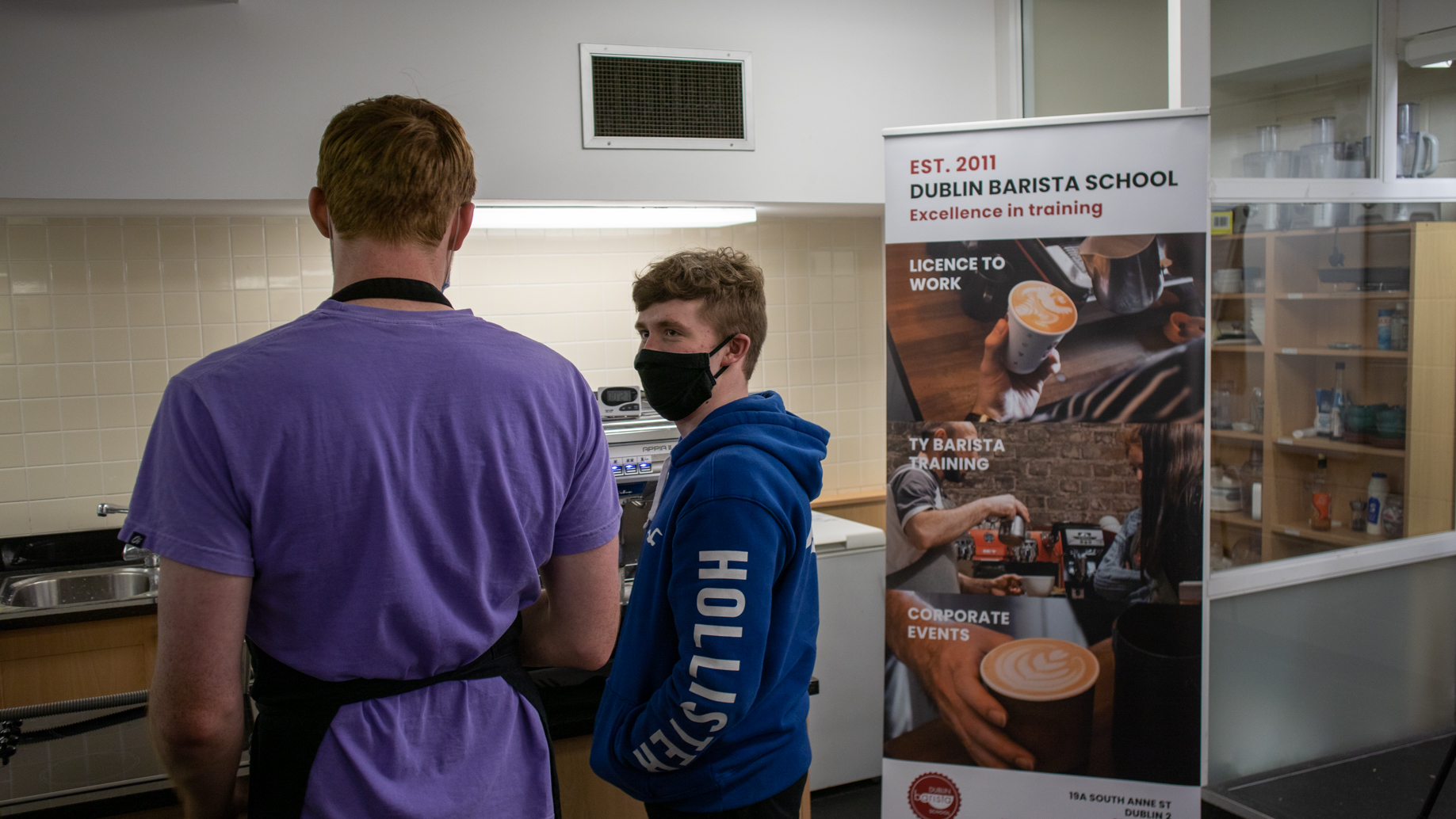 Student talking to instructor