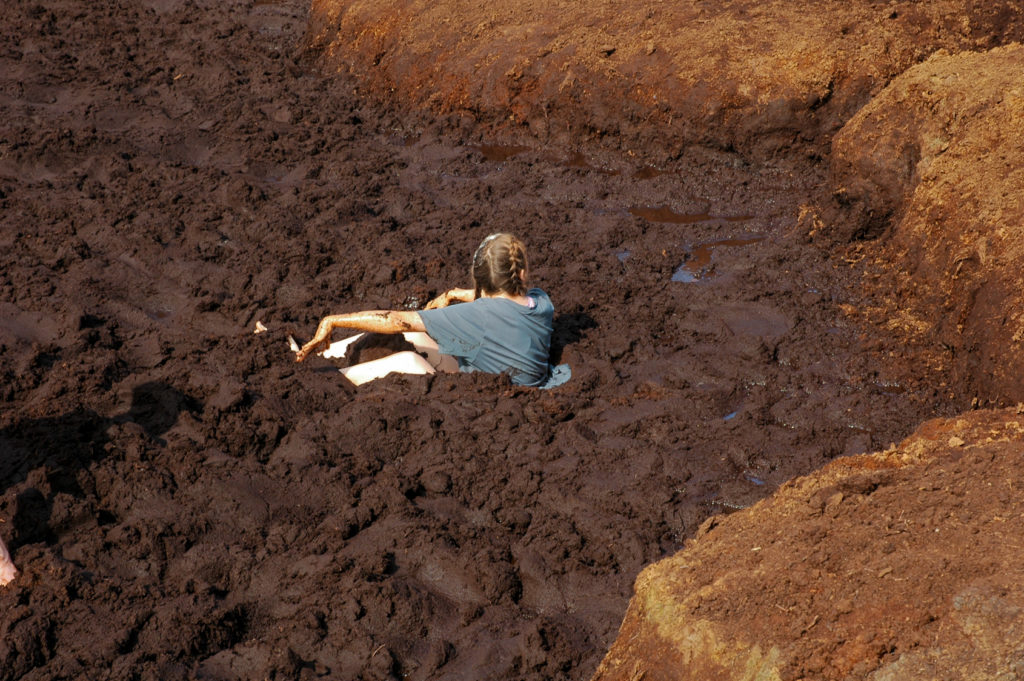 Student Laying in mud