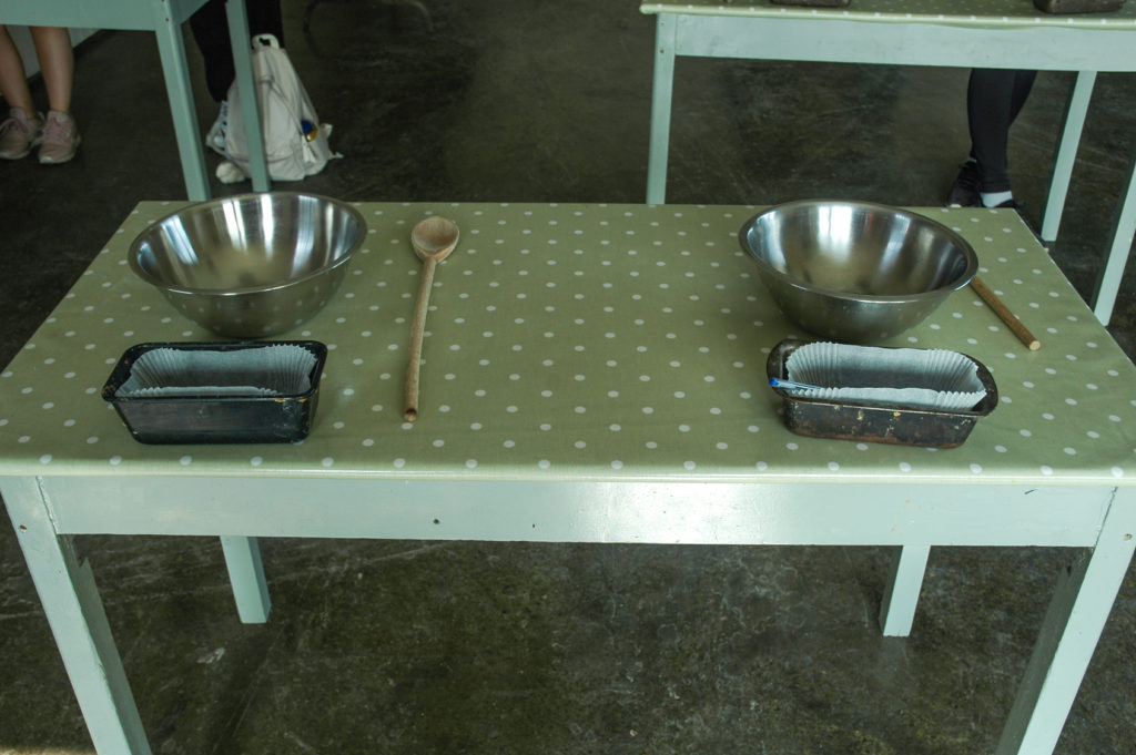 Table with two sets of baking paraphernalia