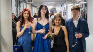 4 students, 3 women and a man