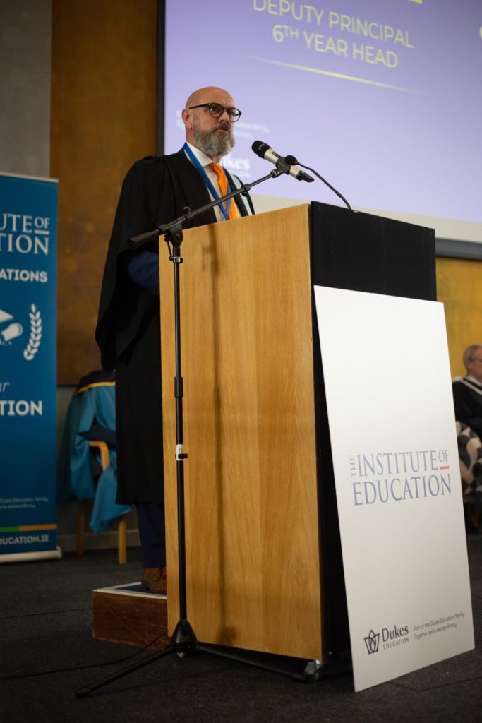 Man giving speech at podium