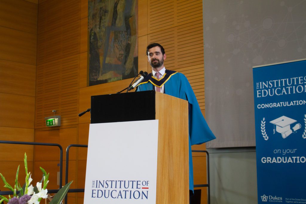 Man giving speech at podium
