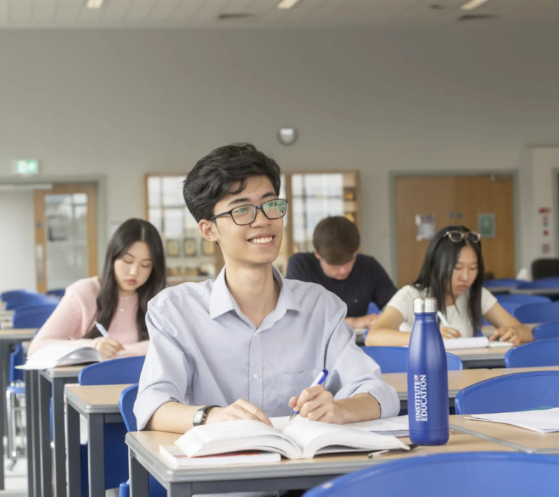 Happy students in class