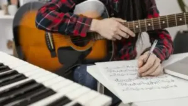 close-up-hand-writing-song-300×169